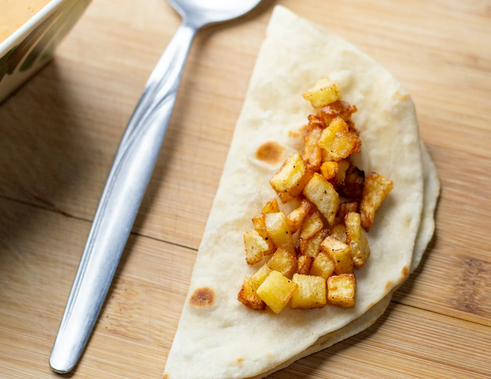 Grilled pineapple, a common accompaniment to al pastor