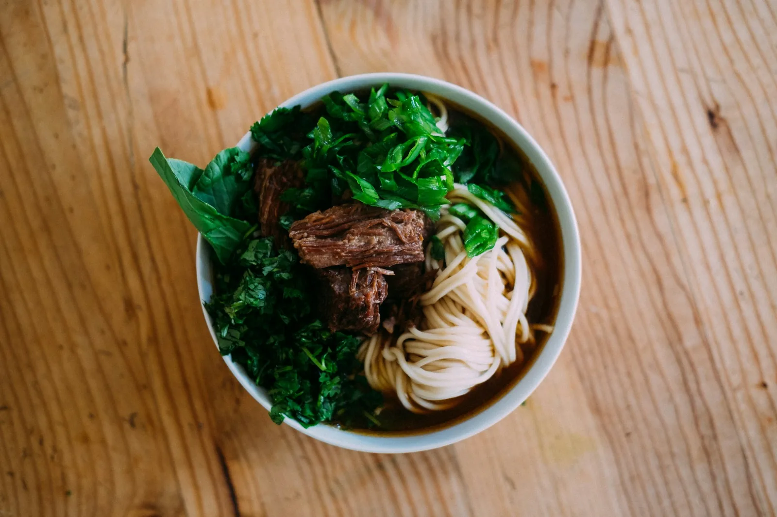 A bowl of rich cooking broth