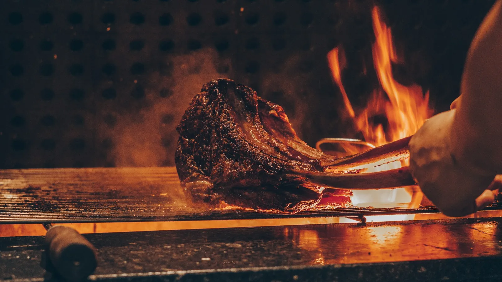 Beef searing over an open flame