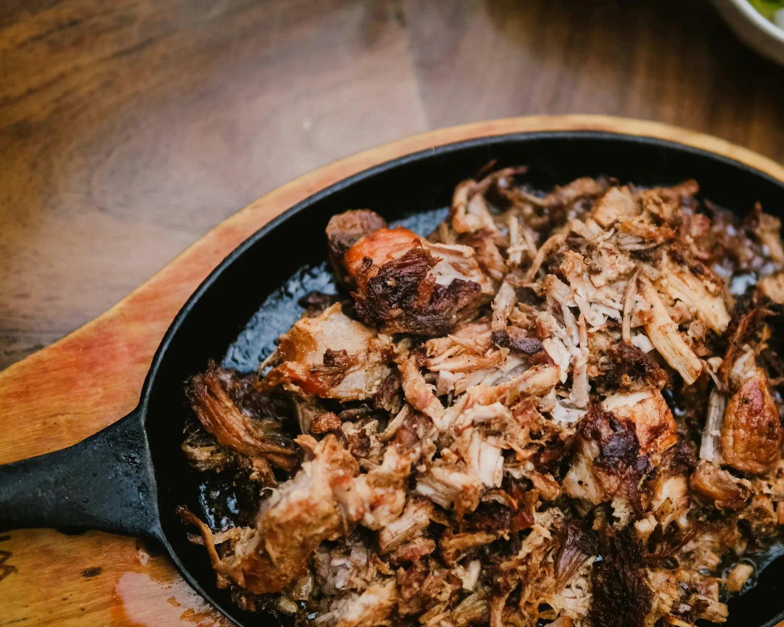 Shredded pork of the kind spooned over a chalupa
