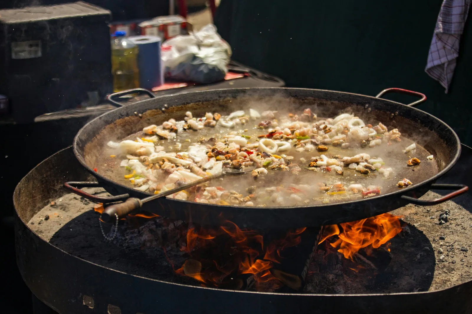 A wide copper pot of the kind used to cook pork slowly