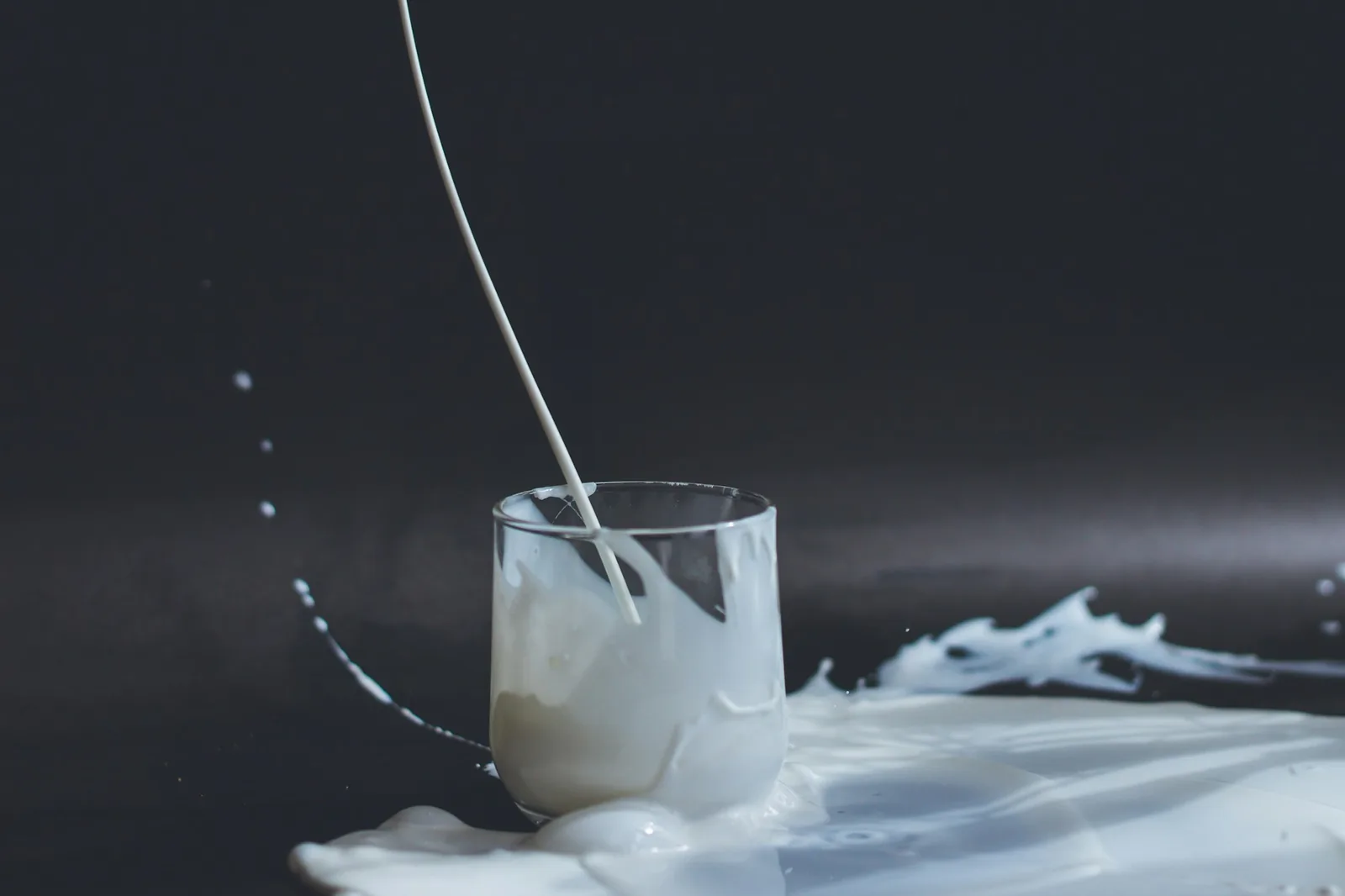 Fresh dairy arranged on a rustic surface