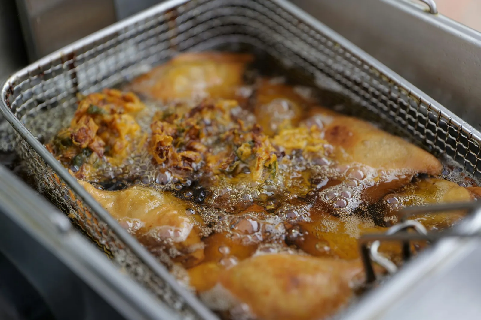 Battered food frying until golden
