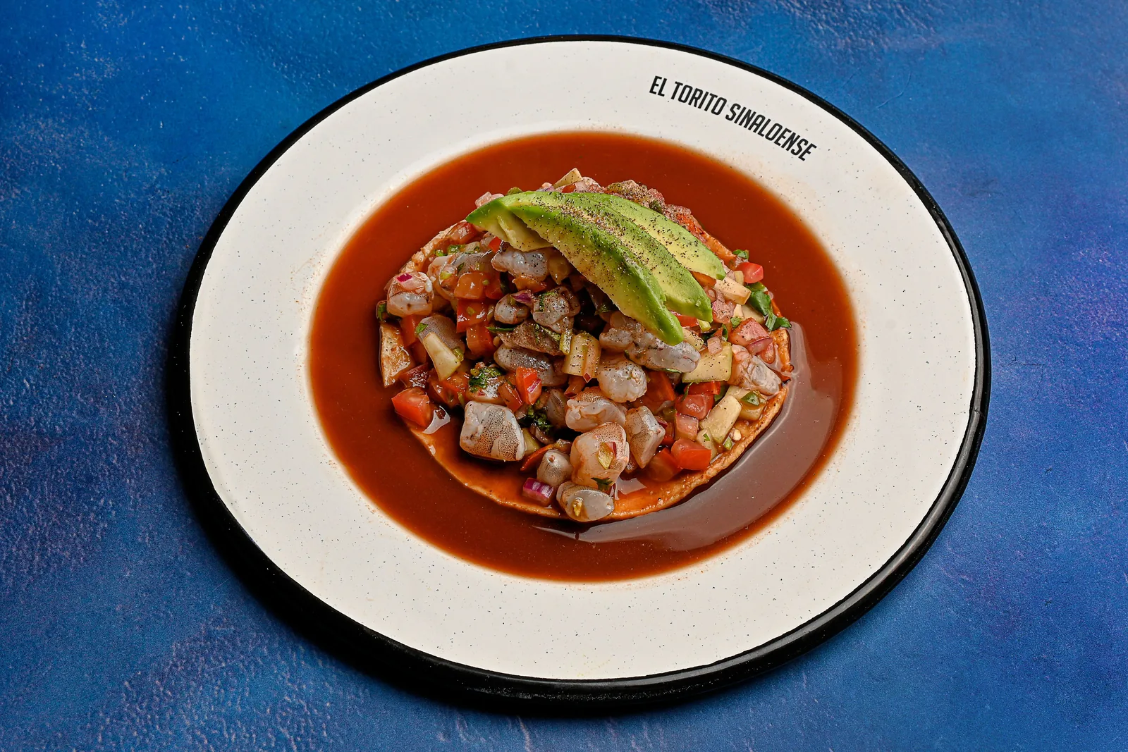 Cured seafood served on a crisp tostada