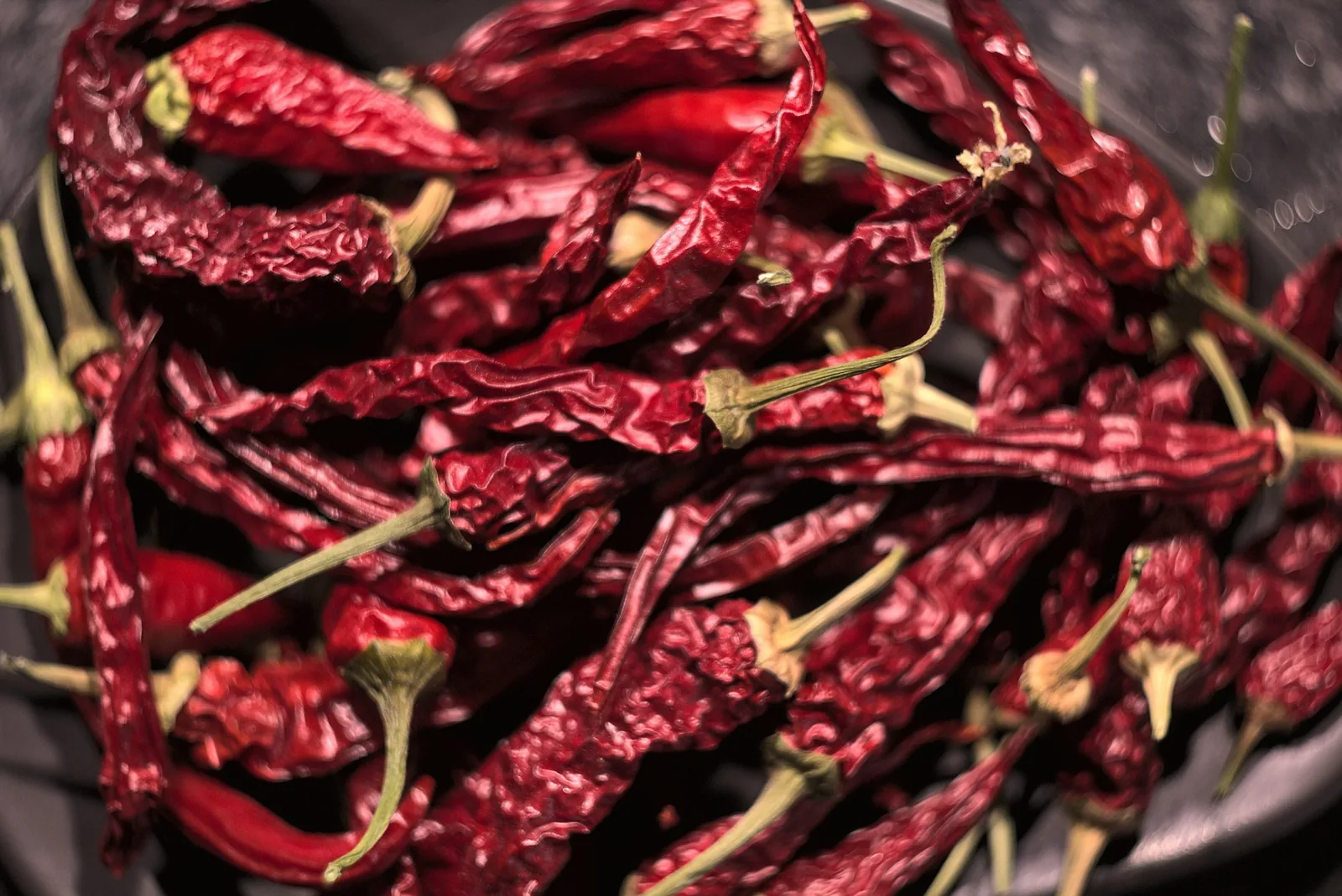 Long, dark, wrinkled dried chillies