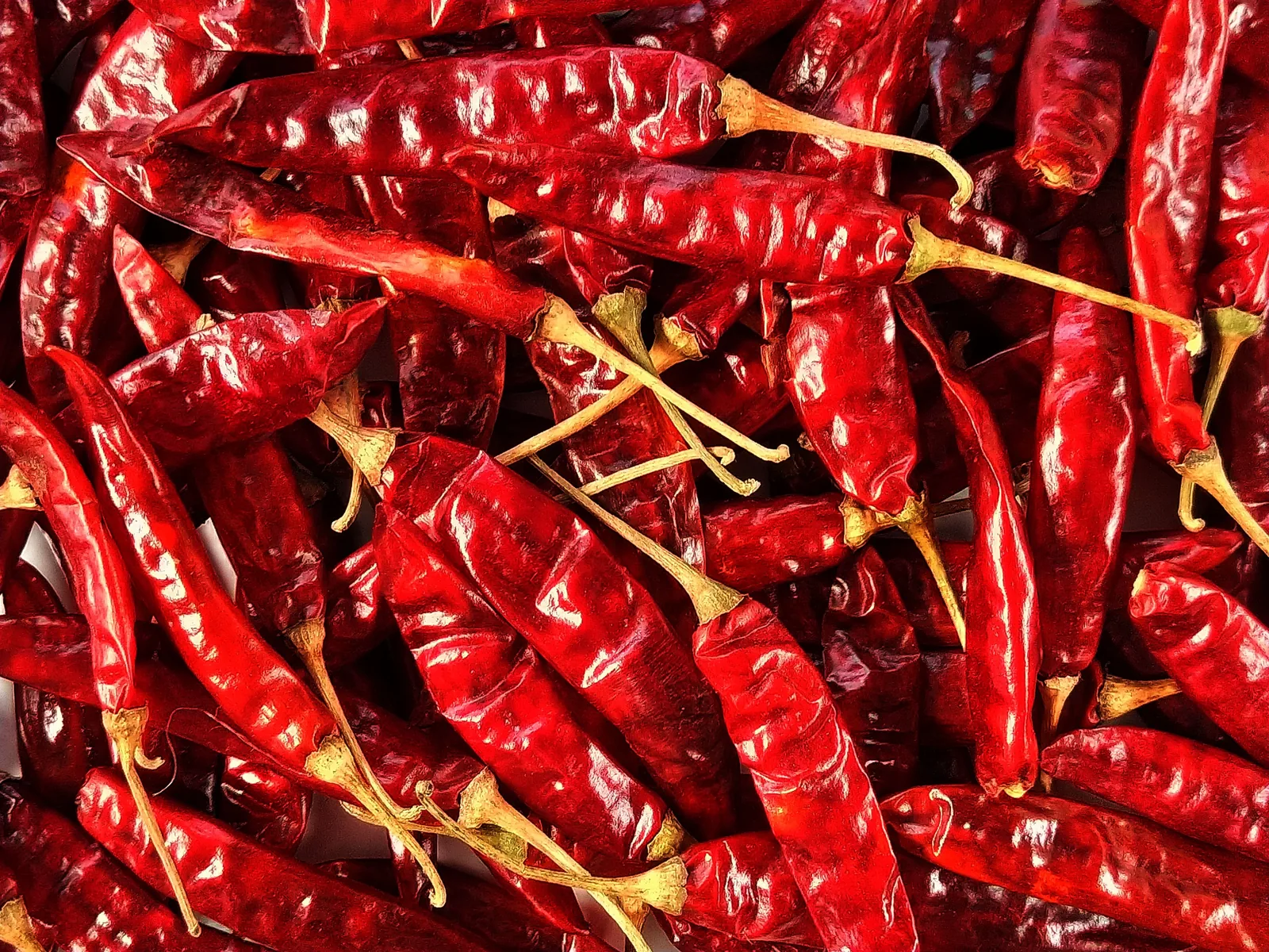 Dried chillies toasting in a dry pan