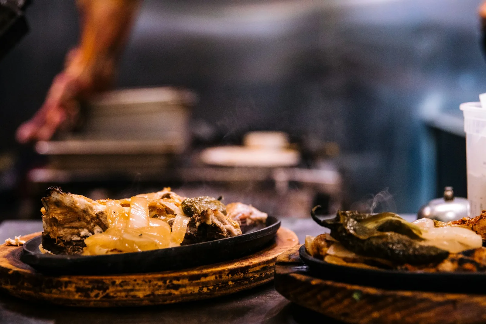A baking dish coming out of the oven