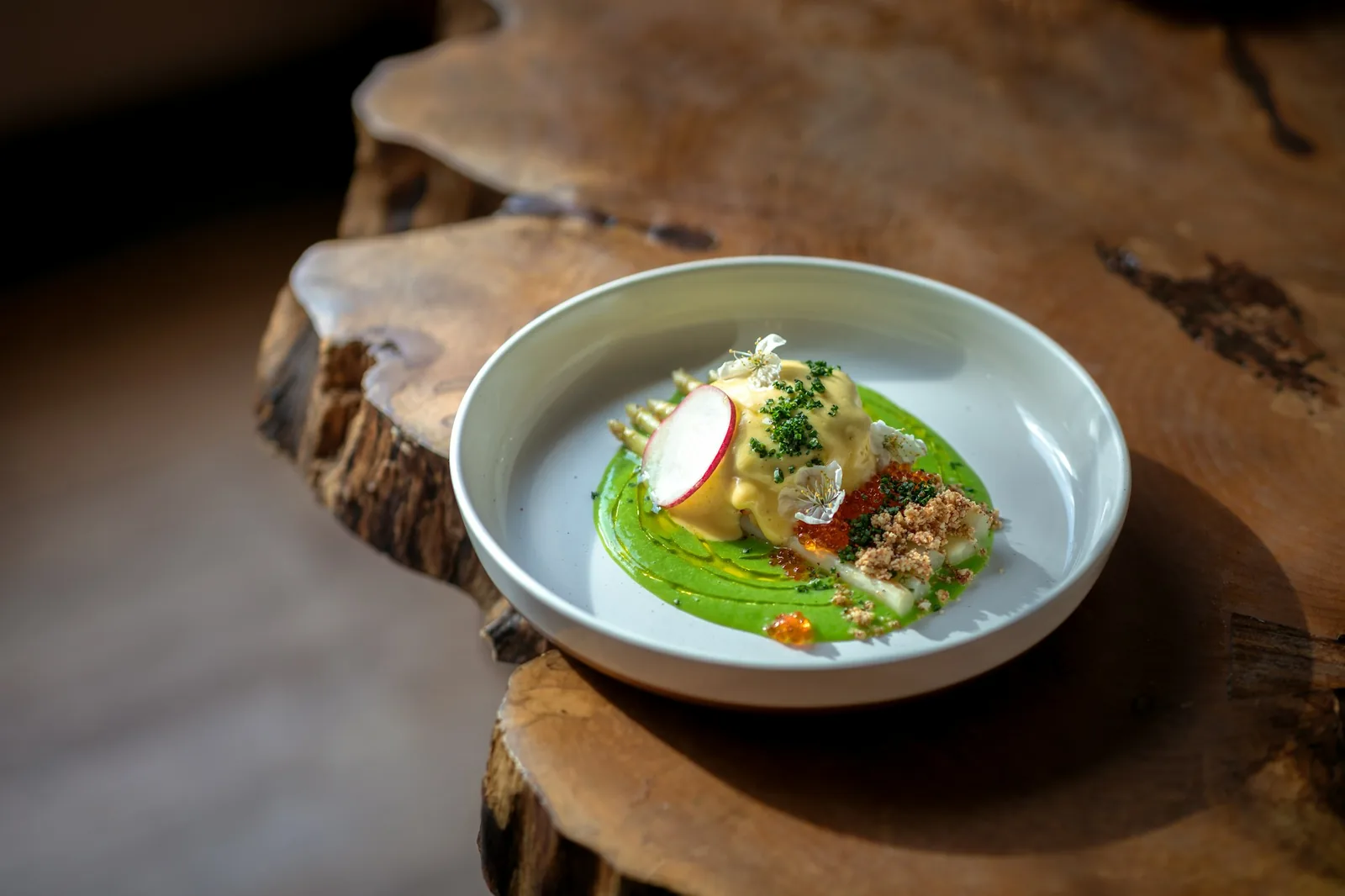 A dish finished with green tomatillo sauce