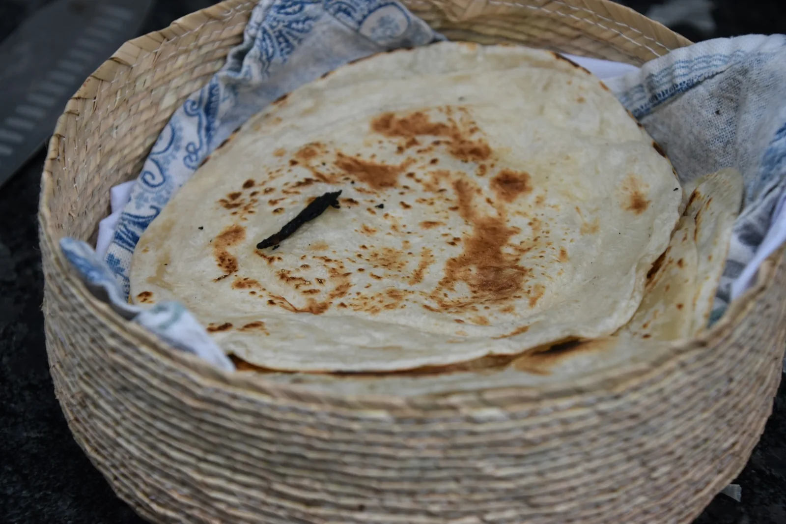 A cold tortilla cracking along a fold
