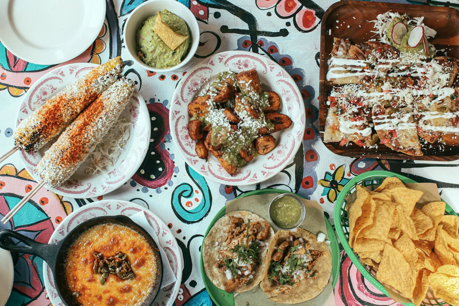 A shared platter of tacos set out for a group