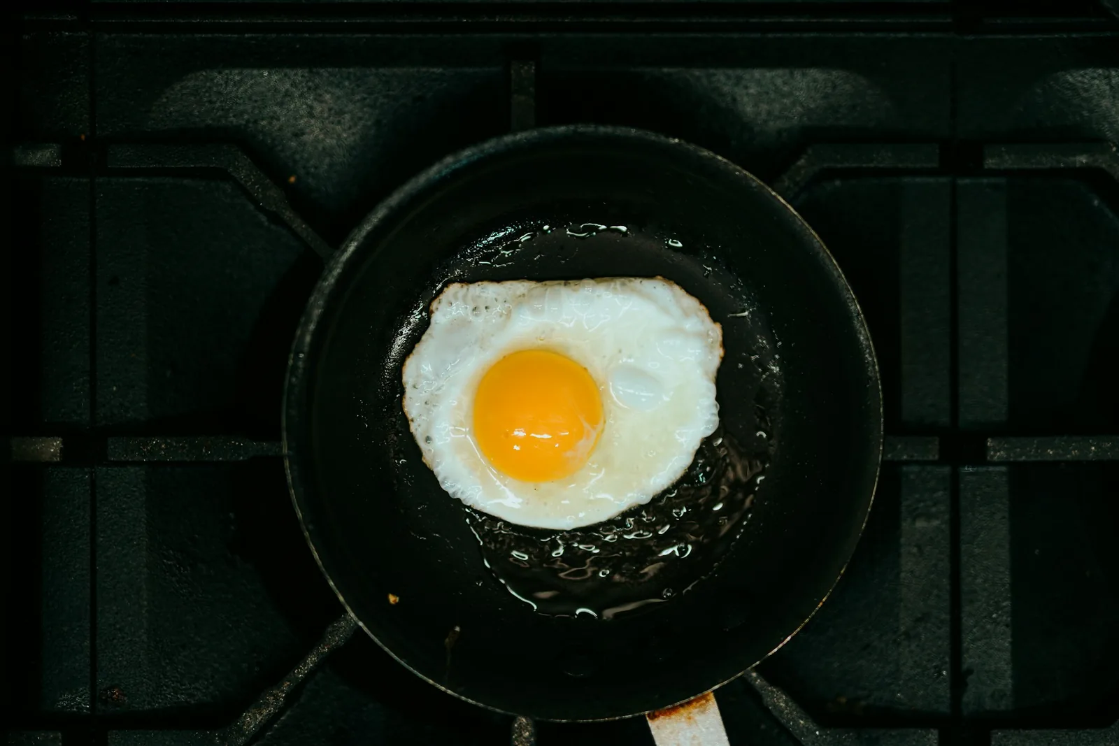 Eggs frying sunny side up