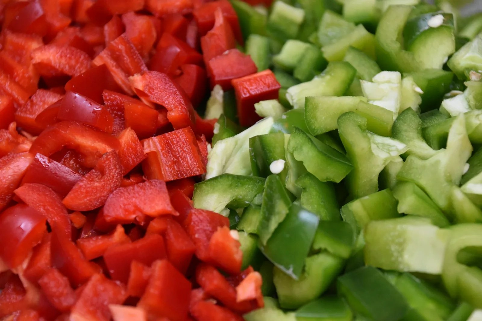 Red and green salsa served side by side