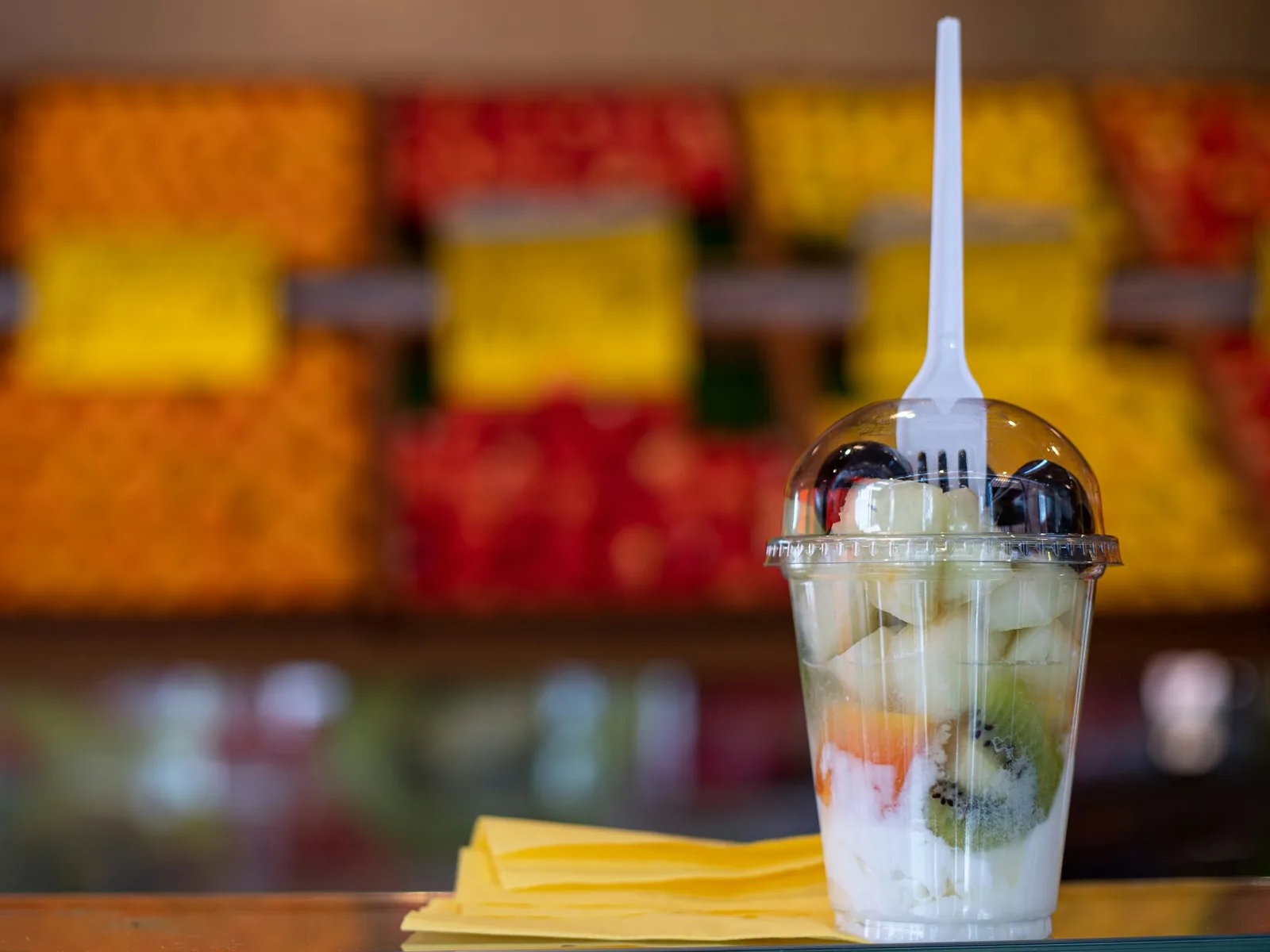 A cup of cut fresh fruit