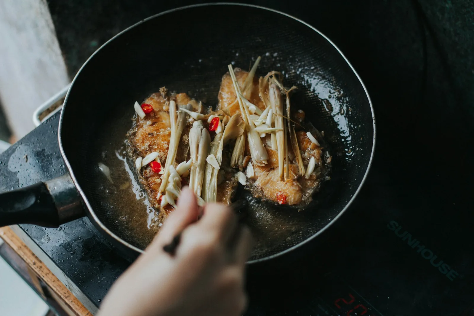 Food being reheated in a dry pan