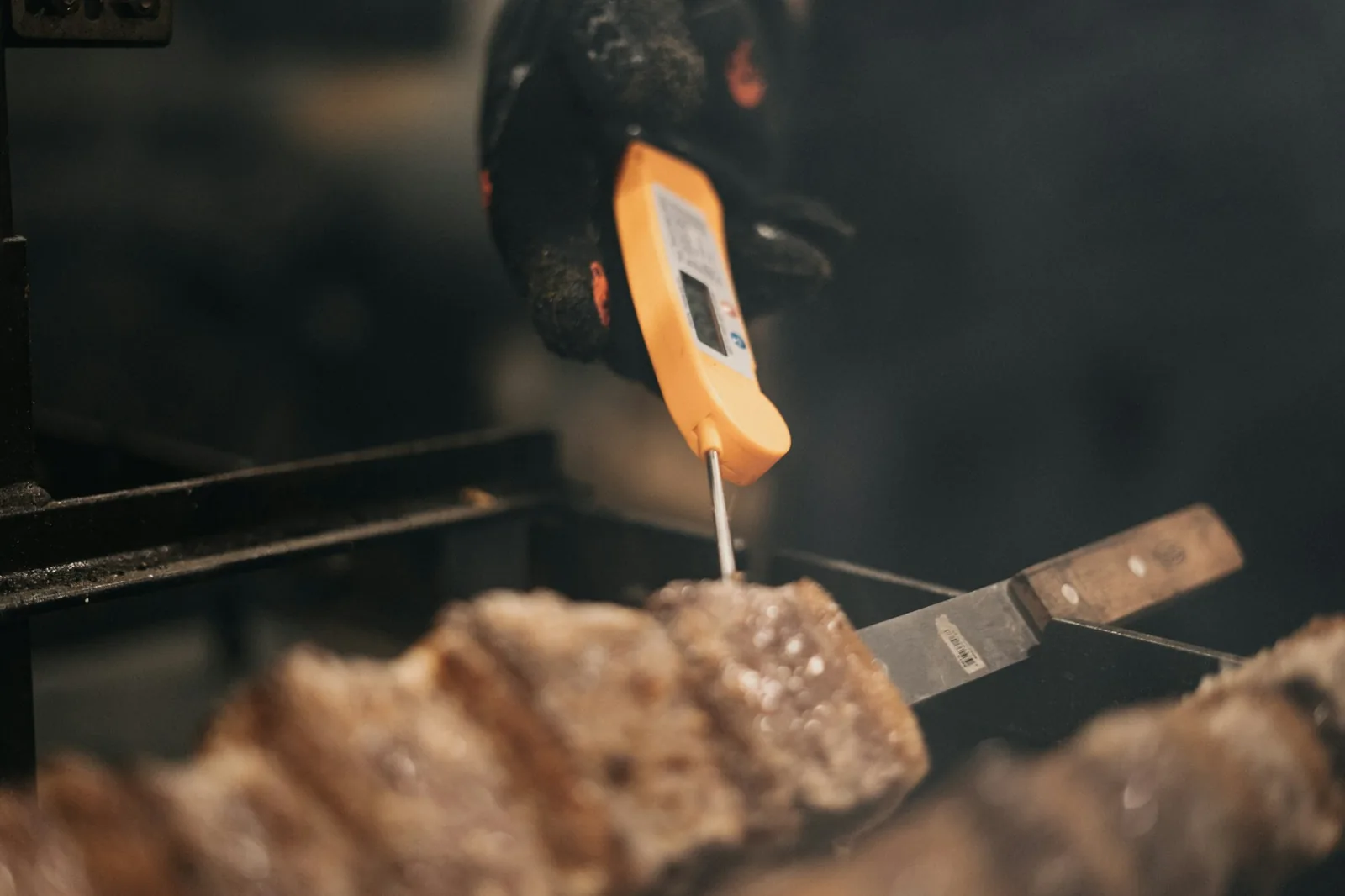 A probe thermometer checking food temperature