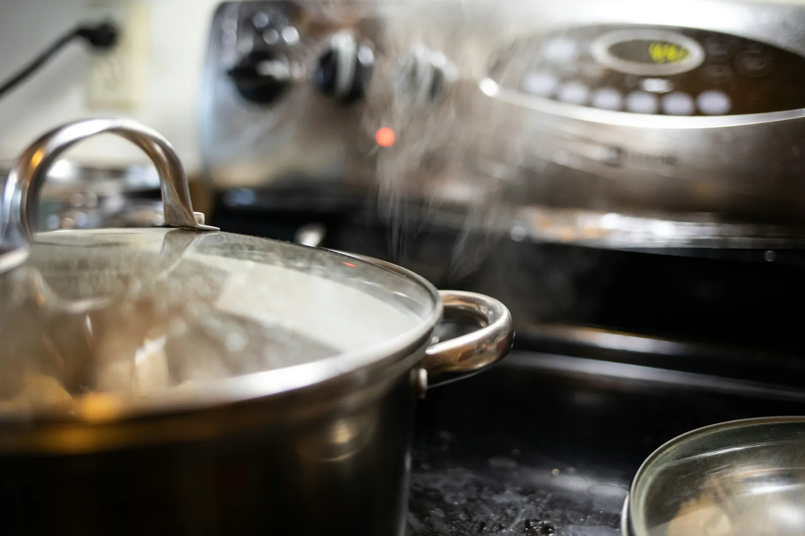Meat braising slowly in a large covered pot