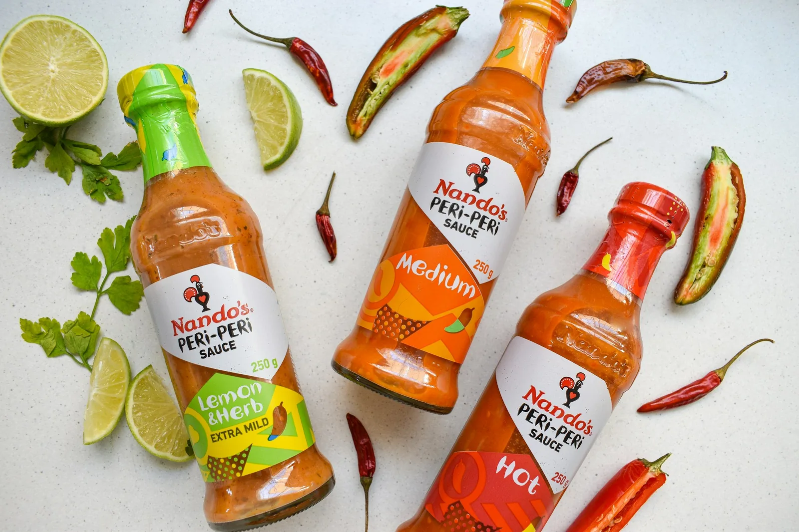 Bottles of hot sauce of the kind stirred into a michelada