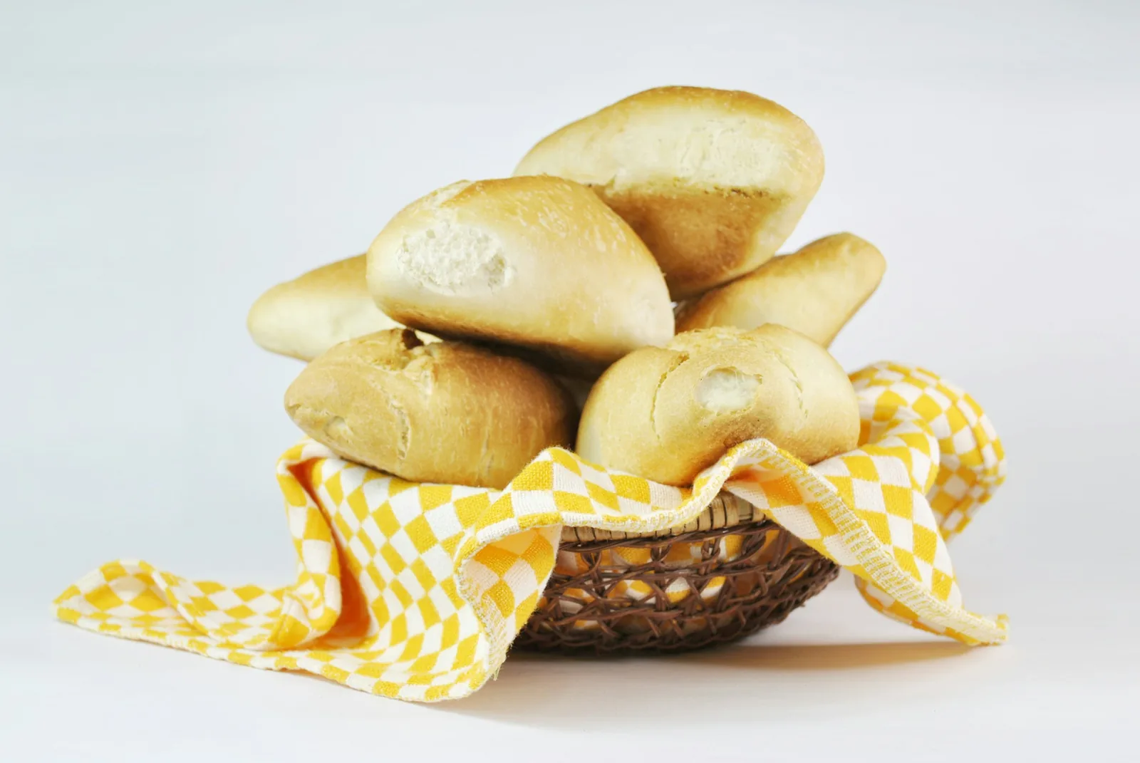 Crusty rolls served alongside soup