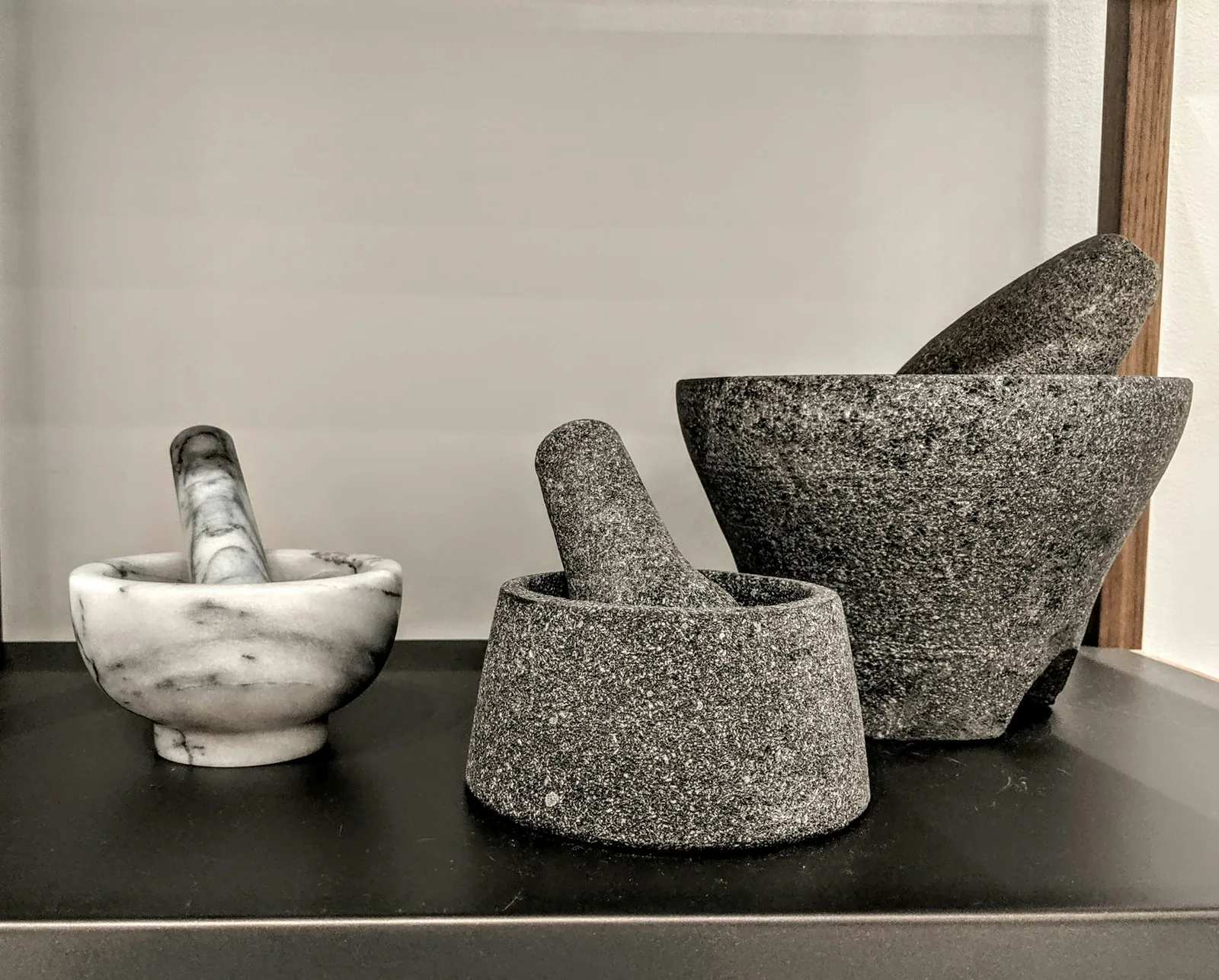 Spices being ground on a stone mortar