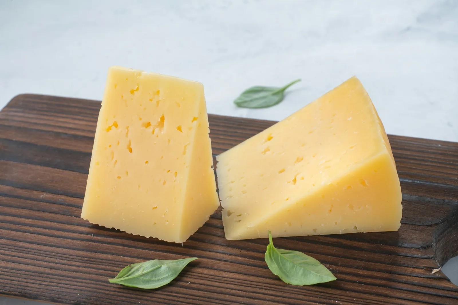 Sliced yellow cheese of the kind used on the original
