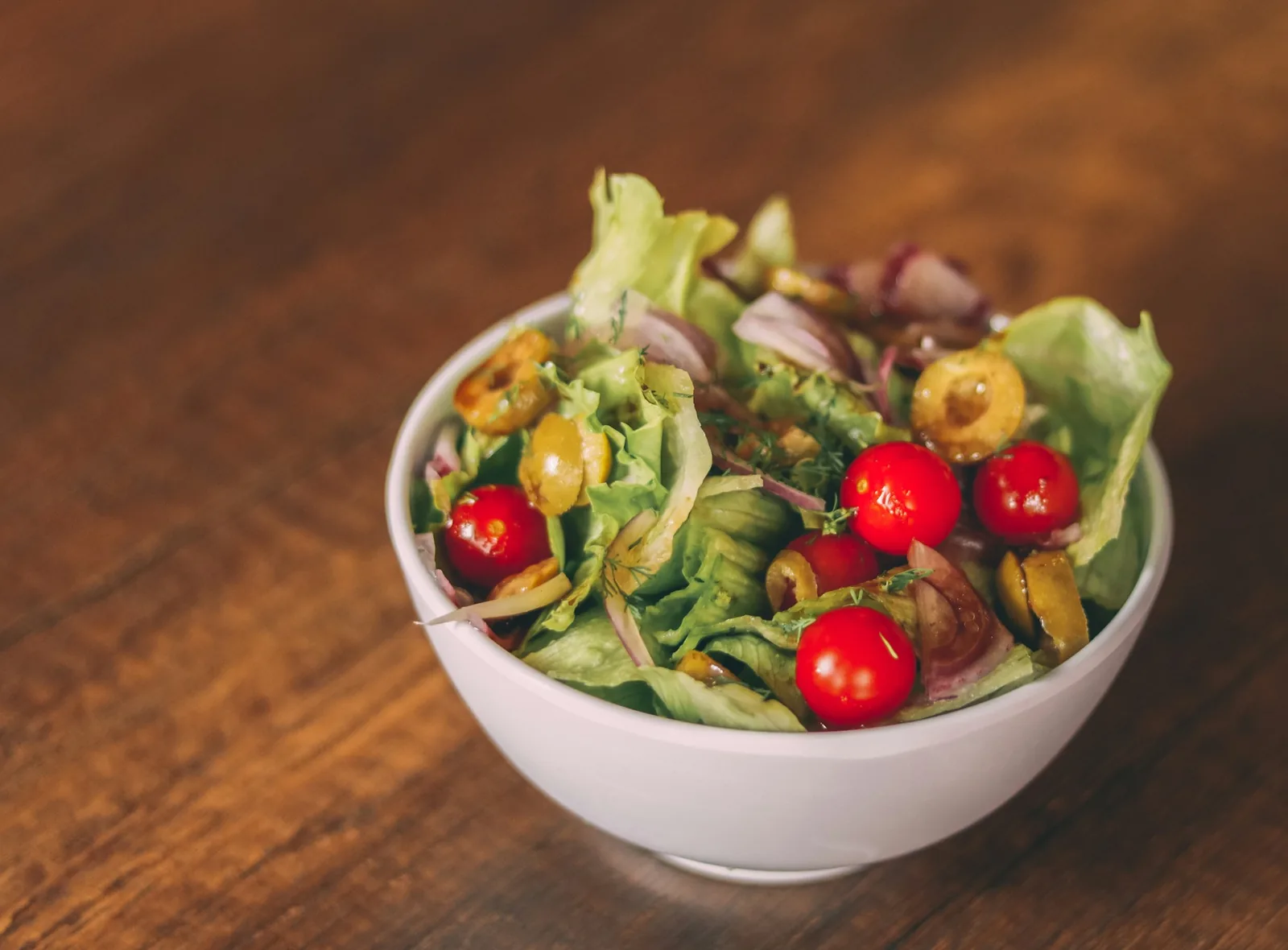 A salad of cactus, tomato, onion and cilantro