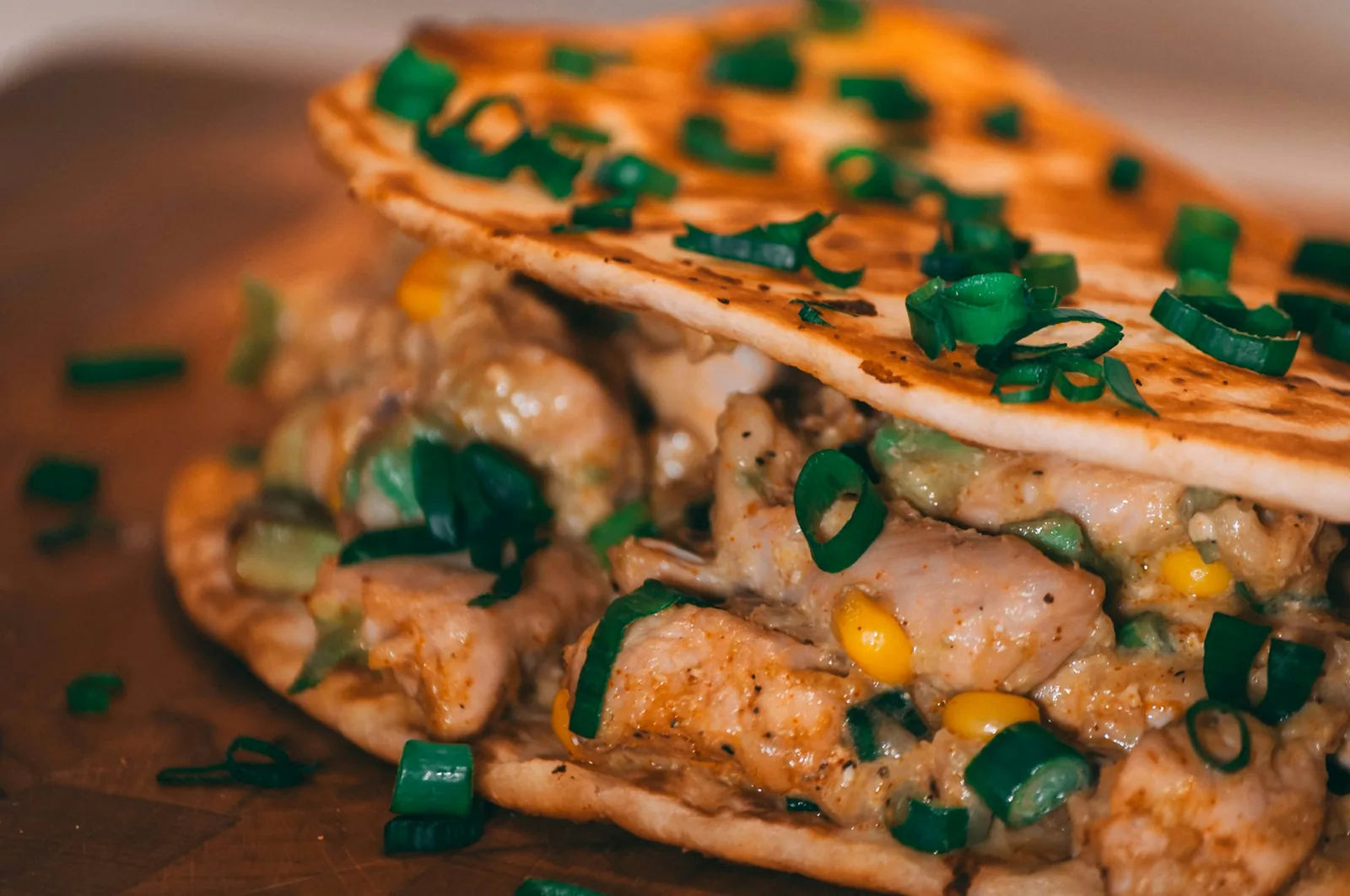 Chicken tacos on corn tortillas with onion and cilantro
