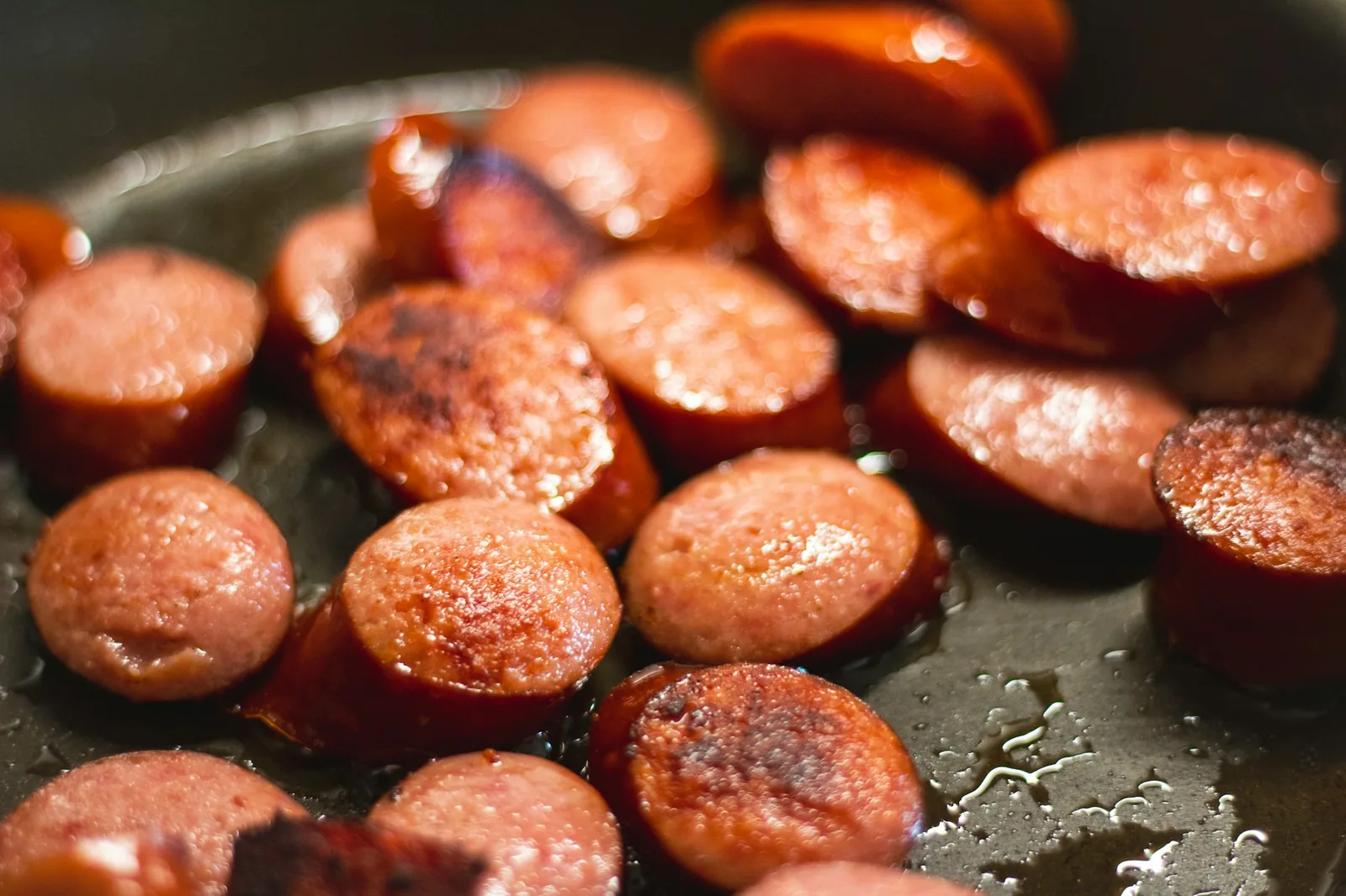 Crumbled chorizo cooking in a pan