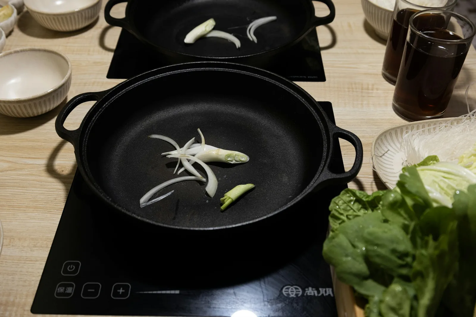 Beans simmering in their cooking liquid