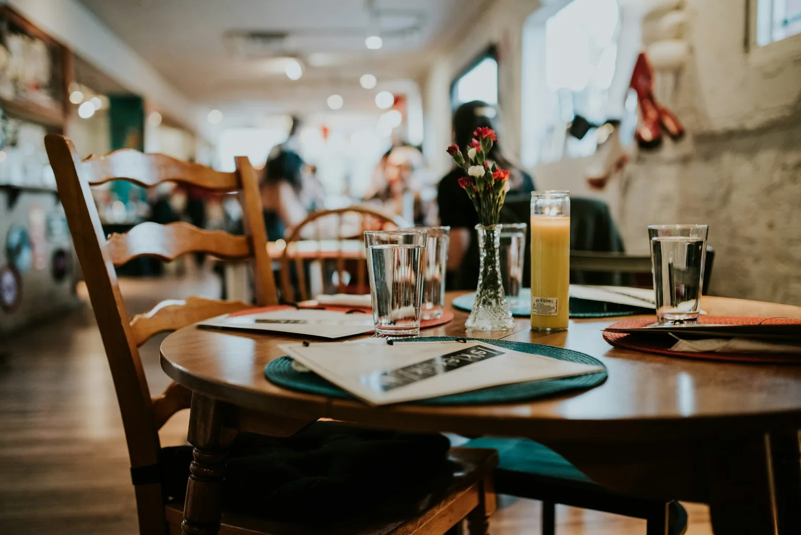 Reading a menu at a restaurant table
