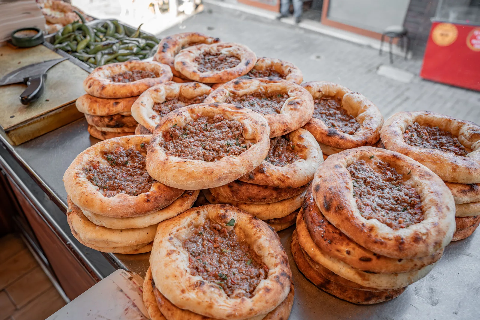 A long, oval masa base topped and served