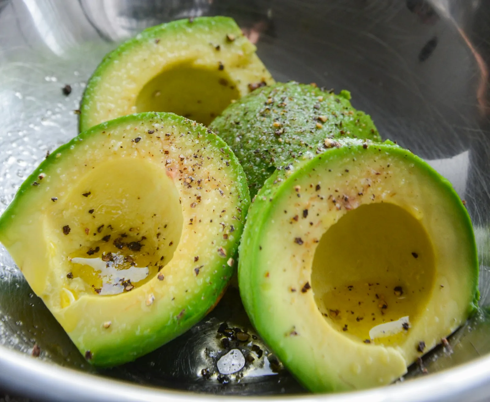 Diced cucumber, onion and avocado stirred through the dish