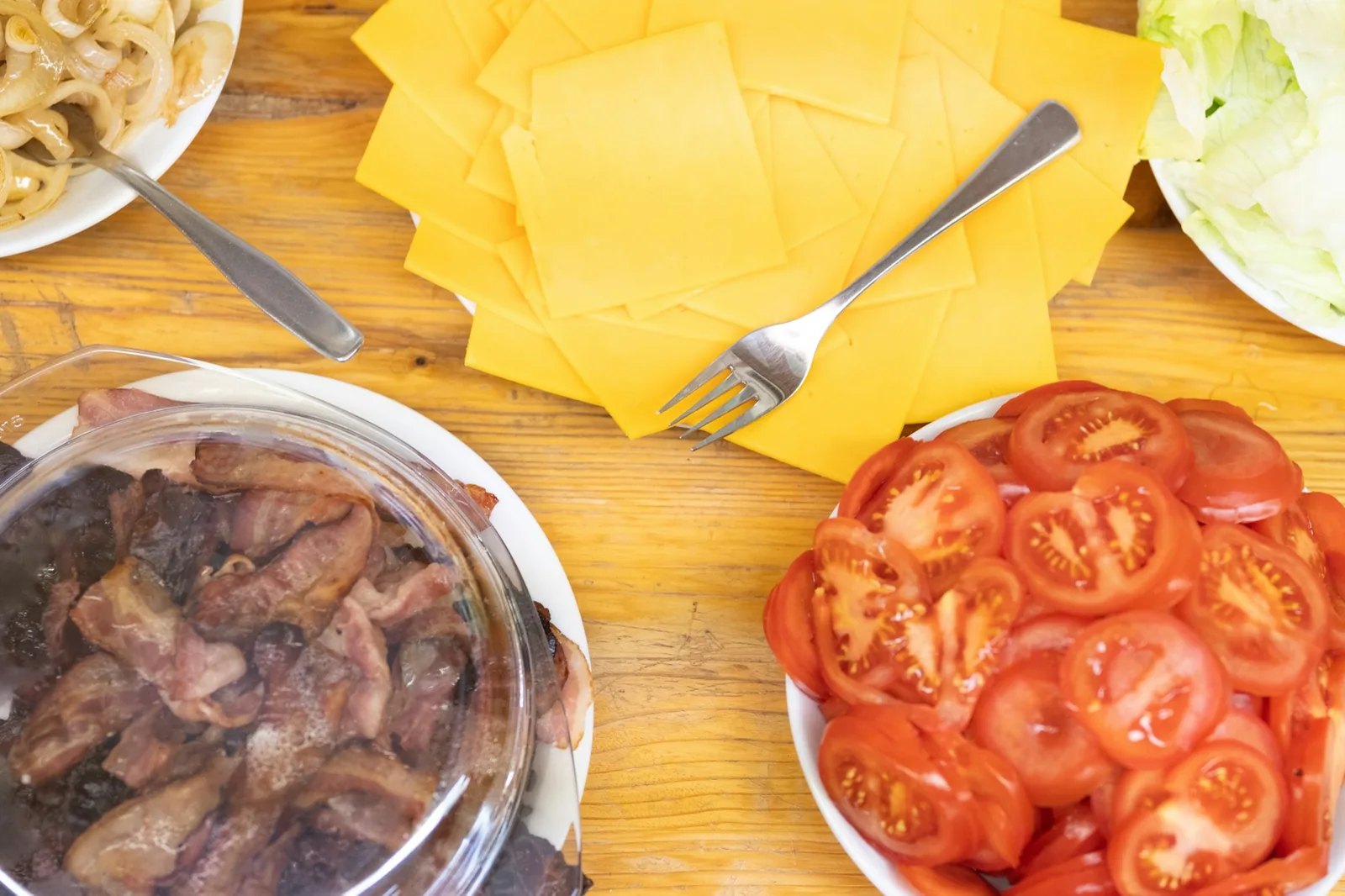 American-style hard-shell tacos filled with lettuce, cheese and tomato