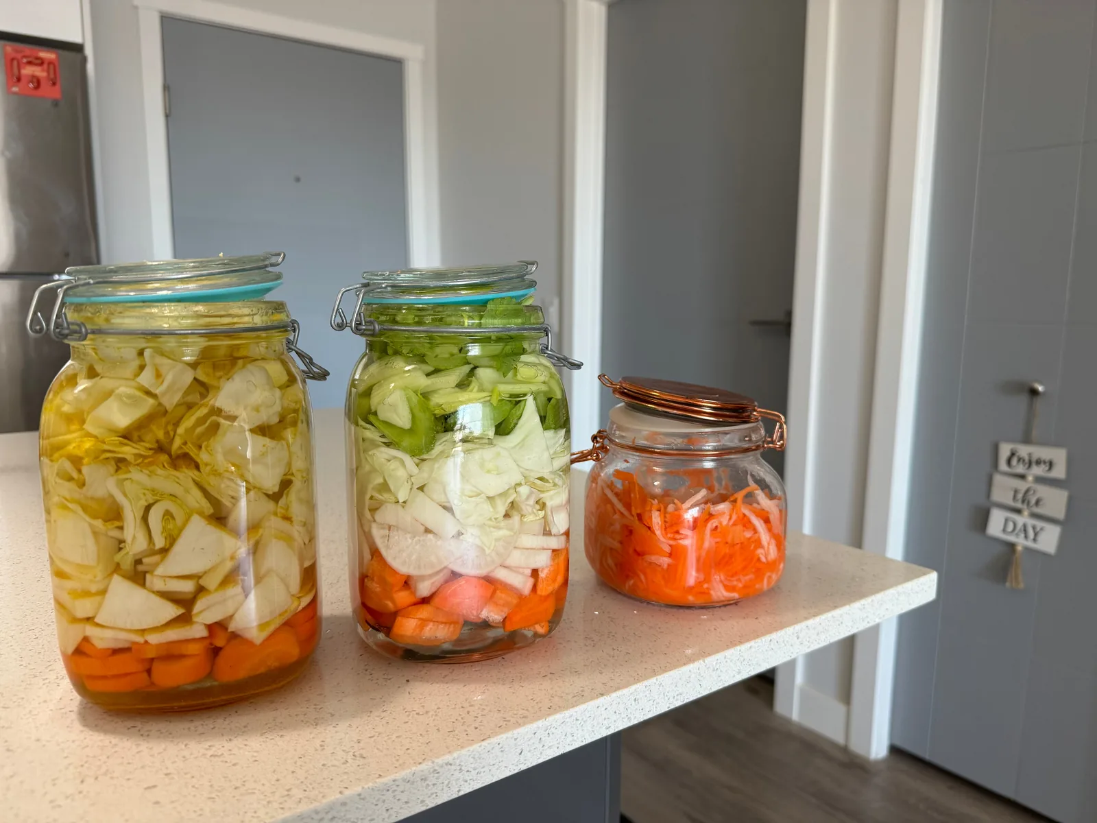 Pickled jalapeños and carrots, served alongside tortas