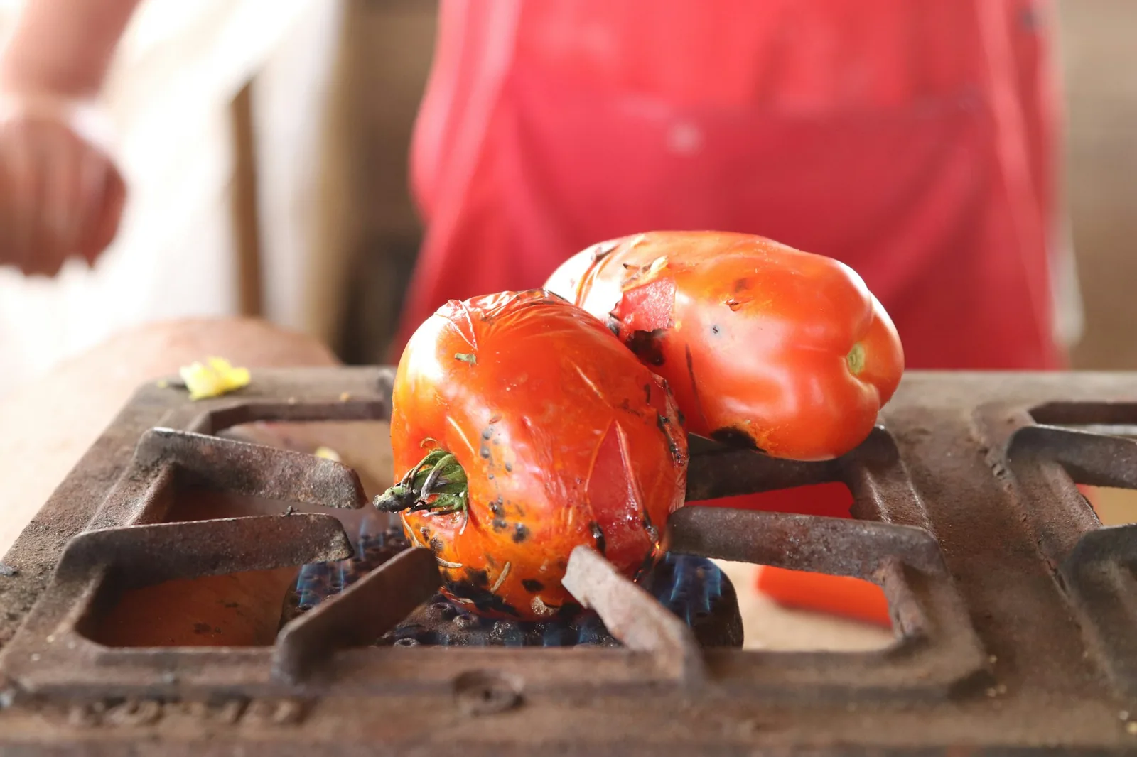 Tomatillos roasting until blistered