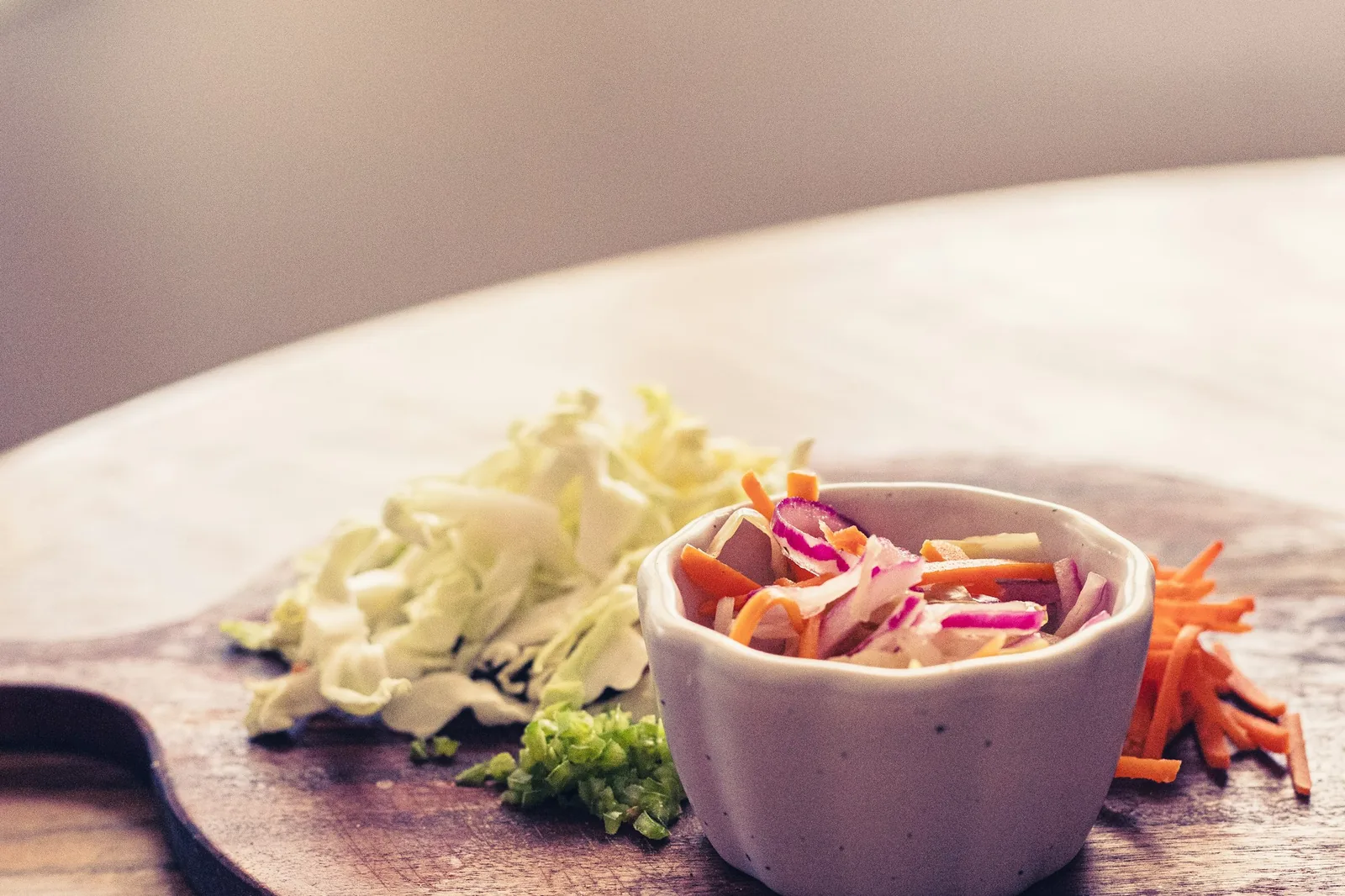 Finely shredded cabbage prepared as a taco topping
